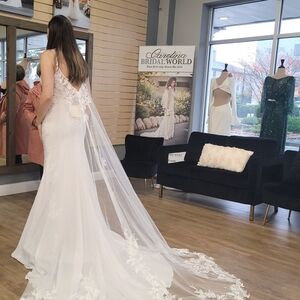 Elegant White Bridal Gown with Lace Details